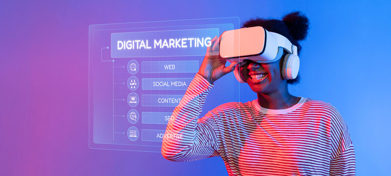 A cheerful young woman interacts with a virtual reality headset while exploring dynamic digital marketing elements displayed in a modern, colorful environment. XDMCP - Powered by Adobe