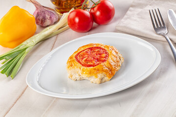 Chicken chop cutlet with cheese and tomato
