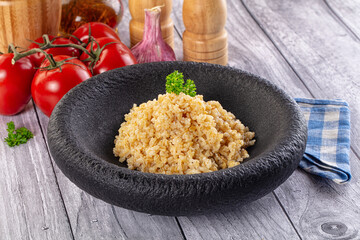 Vegan cuisine - boiled bulgur garnish