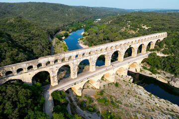 Pont du Gard, ancient Roman aqueduct bridge built in the first century AD crossing river Gardon in...