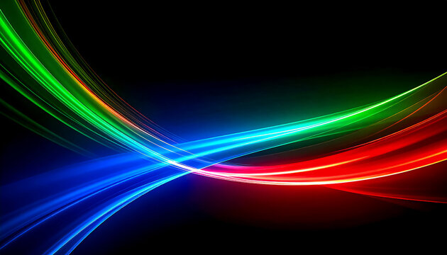 Crossed beams of blue, red and green spectrum light on a black background