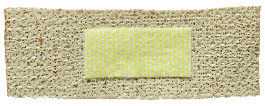 PNG bandage with a yellow polka dot pattern.