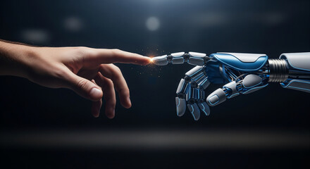 Human and robot hands reaching out, symbolizing the dawn of artificial intelligence and future technology.