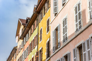 Naklejka premium Colorful facade with windows and shutters in Annecy, France