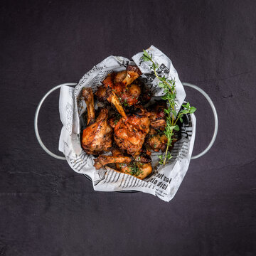 Golden Fried Chicken Pieces in Paper Basket