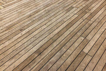 Wooden planks with metal bolts forming floor surface of Queen Emma Bridge in Willemstad. Curacao.