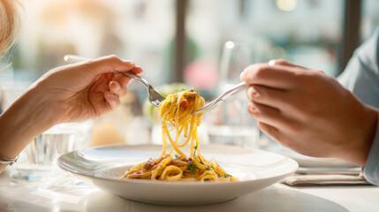 Romantic couple sharing meal. Act of sharing pasta highlights intimacy, connection, making image perfect for restaurant advertisements, Valentine's Day promotions, lifestyle blogs about relationships