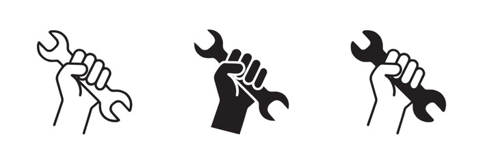 Set of hands holding wrenches  icon in different styles  ,symbolizing labor and repair. vector illustration.