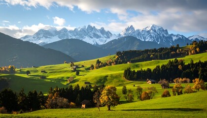 Obraz premium Alpine valley at sunset with snow-capped peaks