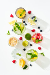 Summer drinks, colored cocktails on white background.