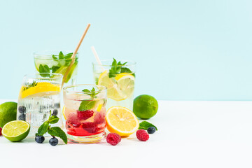 Lemonade set on colored background.