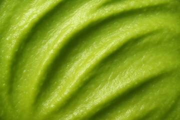 Creamy green avocado close-up showing smooth, rich texture and natural pattern, ideal for health, vegan, and culinary themes.