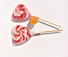 Heart shaped Lollipops in Clear Wrappers Mockup