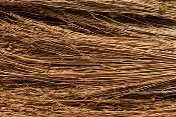 Wicker background. Texture of dried grass. Closeup.