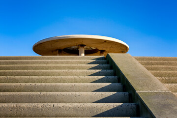 A modern circular shelter rises above concrete steps on Cleveleys seafront, featured as Niamos in Andor, Episode 7,bathed in crisp November light and cinematic history.
