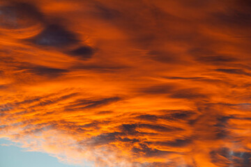 Stratocumulus clouds or potentially Altocumulus clouds