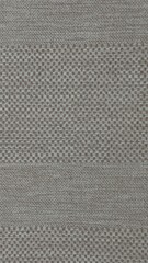 Woven fabric texture with alternating patterns — decorative background for interior design, textile projects, and visual content
