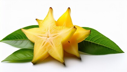 Fototapeta premium freshly sliced starfruit with green leaves on white background