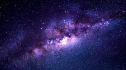 Fototapeta premium Vibrant Milky Way galaxy spans with shining light among myriad distant stars