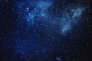 Naklejka premium Starry sky background, blue night sky full of stars, glowing stars in the dark space, starry background, dark night, stars in the distance, starlight, dark background with a blue glow, night sky. 