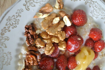 healthy oatmeal with nuts and fresh berries