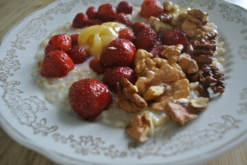 healthy oatmeal with nuts and fresh berries