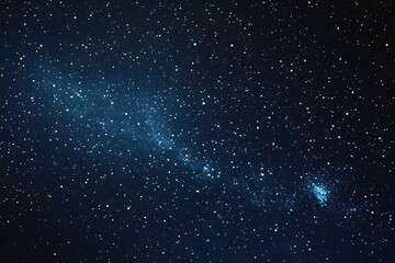 Obraz premium Starry sky background, blue night sky full of stars, glowing stars in the dark space, starry background, dark night, stars in the distance, starlight, dark background with a blue glow, night sky. 