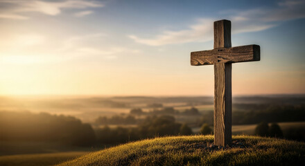 A lone wooden cross on a hilltop, silhouetted against a beautiful sunset sky, radiating peace and hope. A symbol of faith, standing tall over a serene landscape.