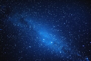 Naklejka premium Starry sky background, blue night sky full of stars, glowing stars in the dark space, starry background, dark night, stars in the distance, starlight, dark background with a blue glow, night sky. 