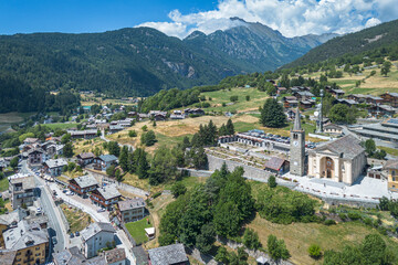 Fototapeta premium Aerial view of Brusson, a typical alpine village in Ayas Valley, Aosta Valley region, Italy