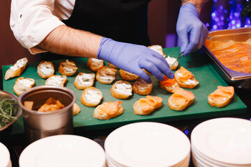 Chef Preparing Salmon finger sandwiches at Event