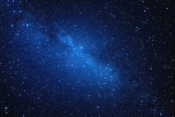 Obraz premium Starry sky background, blue night sky full of stars, glowing stars in the dark space, starry background, dark night, stars in the distance, starlight, dark background with a blue glow, night sky. 