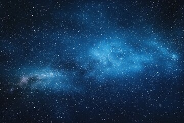 Obraz premium Starry sky background, blue night sky full of stars, glowing stars in the dark space, starry background, dark night, stars in the distance, starlight, dark background with a blue glow, night sky. 