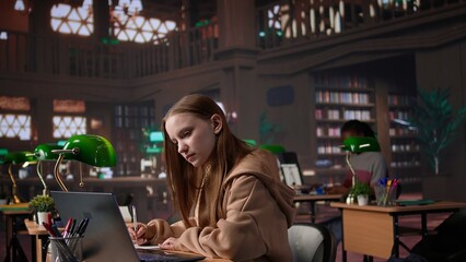 Academic student working on diploma essay in a calm library environment, employing mixed educational database on campus. Dedication and strong focus on achieving intellectual goals. Camera B.