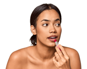 Filipino woman applying lipstick, beauty touch