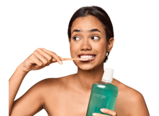 Young Filipino with toothbrush and mouthwash, oral care