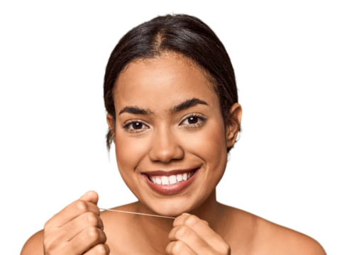 Young Filipino using dental floss, oral care focus