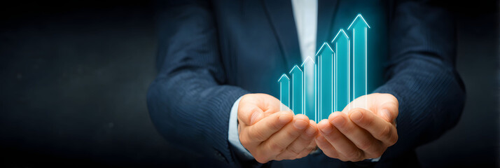 Businessman's Hands Holding a Teal Upward Trending Graph on Dark Background