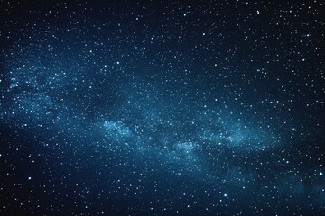 Obraz premium Starry sky background, blue night sky full of stars, glowing stars in the dark space, starry background, dark night, stars in the distance, starlight, dark background with a blue glow, night sky. 