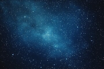 Obraz premium Starry sky background, blue night sky full of stars, glowing stars in the dark space, starry background, dark night, stars in the distance, starlight, dark background with a blue glow, night sky. 