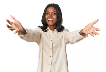 Portrait of a young Indian woman feels confident giving a hug to the camera.