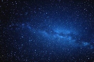 Obraz premium Starry sky background, blue night sky full of stars, glowing stars in the dark space, starry background, dark night, stars in the distance, starlight, dark background with a blue glow, night sky. 