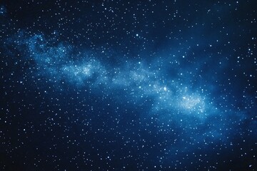 Obraz premium Starry sky background, blue night sky full of stars, glowing stars in the dark space, starry background, dark night, stars in the distance, starlight, dark background with a blue glow, night sky. 
