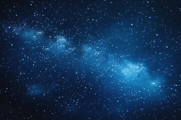 Obraz premium Starry sky background, blue night sky full of stars, glowing stars in the dark space, starry background, dark night, stars in the distance, starlight, dark background with a blue glow, night sky. 