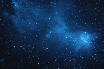 Obraz premium Starry sky background, blue night sky full of stars, glowing stars in the dark space, starry background, dark night, stars in the distance, starlight, dark background with a blue glow, night sky. 