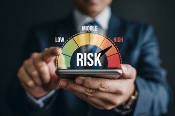 Businessman analyzes financial risk on a digital gauge displayed on a smartphone screen