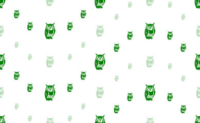 Seamless pattern of large and small green owl symbols. The elements are arranged in a wavy. Illustration on light green background