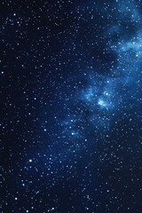 Fototapeta premium Starry sky background, blue night sky full of stars, glowing stars in the dark space, starry background, dark night, stars in the distance, starlight, dark background with a blue glow, night sky.