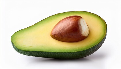 half of a ripe avocado with the pit isolated on a white background