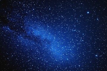 Fototapeta premium Starry sky background, blue night sky full of stars, glowing stars in the dark space, starry background, dark night, stars in the distance, starlight, dark background with a blue glow, night sky.